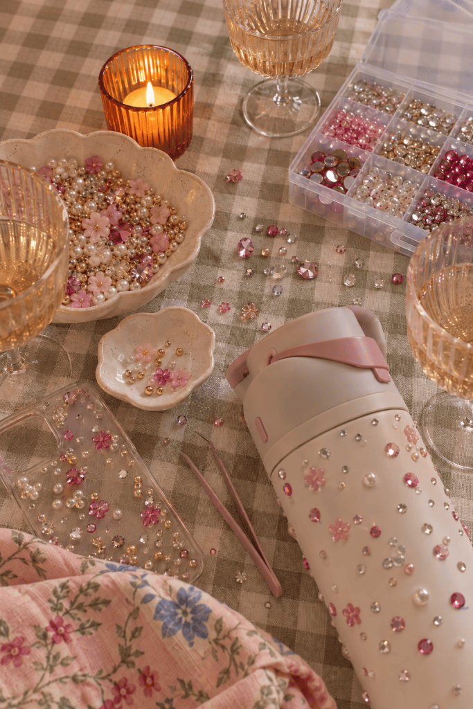 Colorful gem art project for a girls night, featuring rhinestones and sparkly craft supplies for a fun DIY activity with friends.